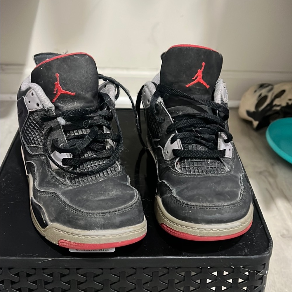 Jordan Black and Red Sneakers with Mesh Panels